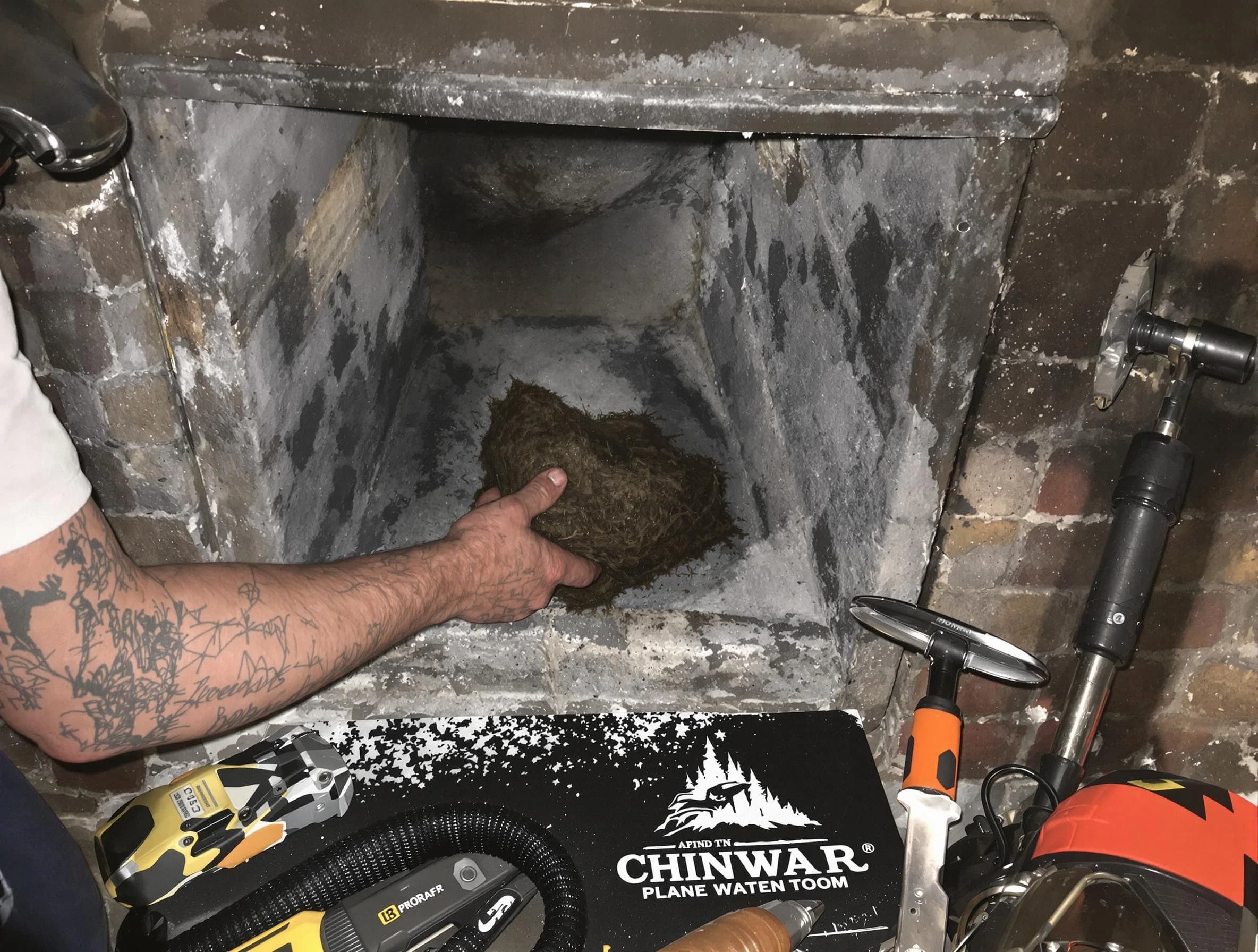 Peters Chimney Sweep safely removing debris and screening chimney in Peters, PA